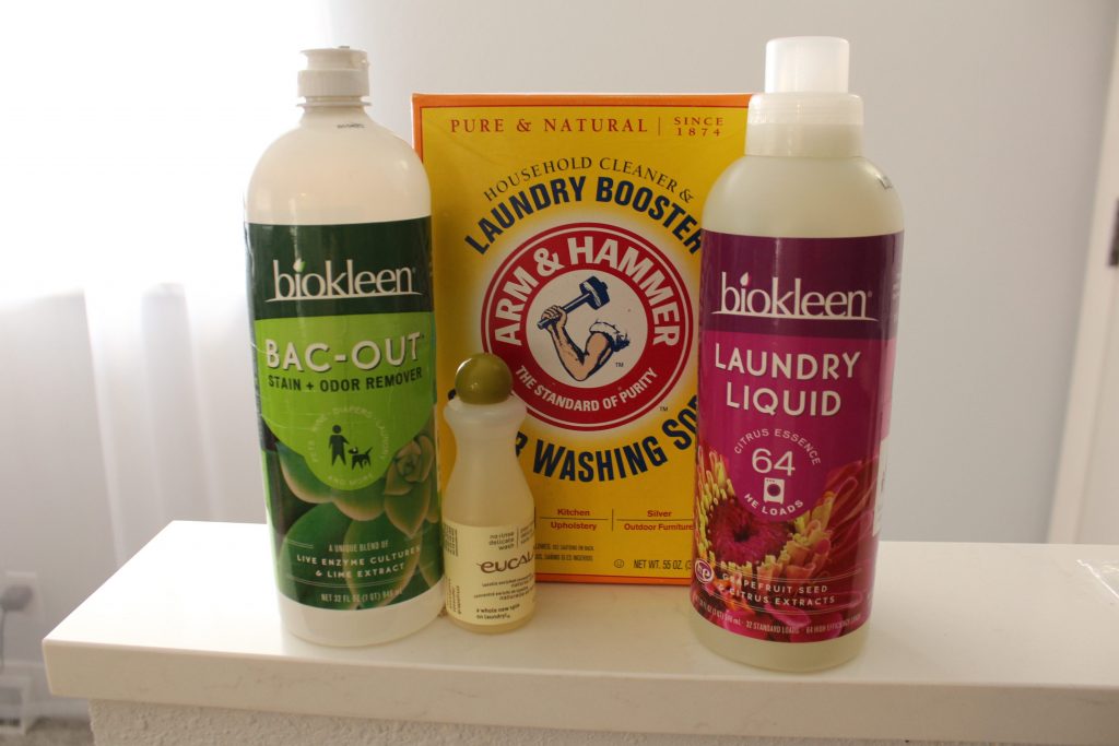 Banner image for how to wash cloth diapers that includes four different detergent options
